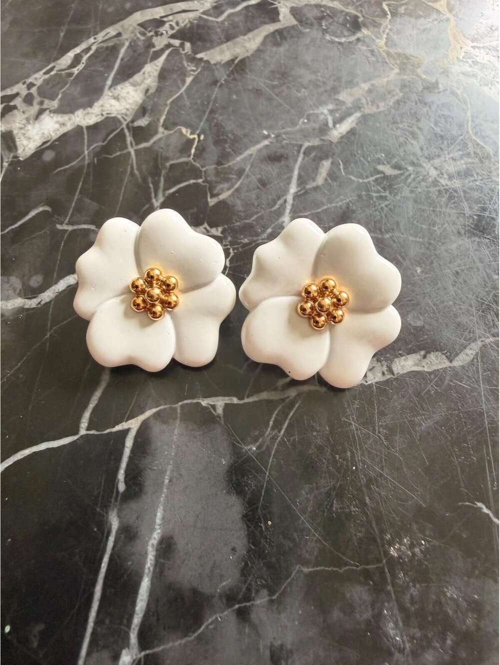 Vintage Monet white and gold beaded enamel flower clip on earrings